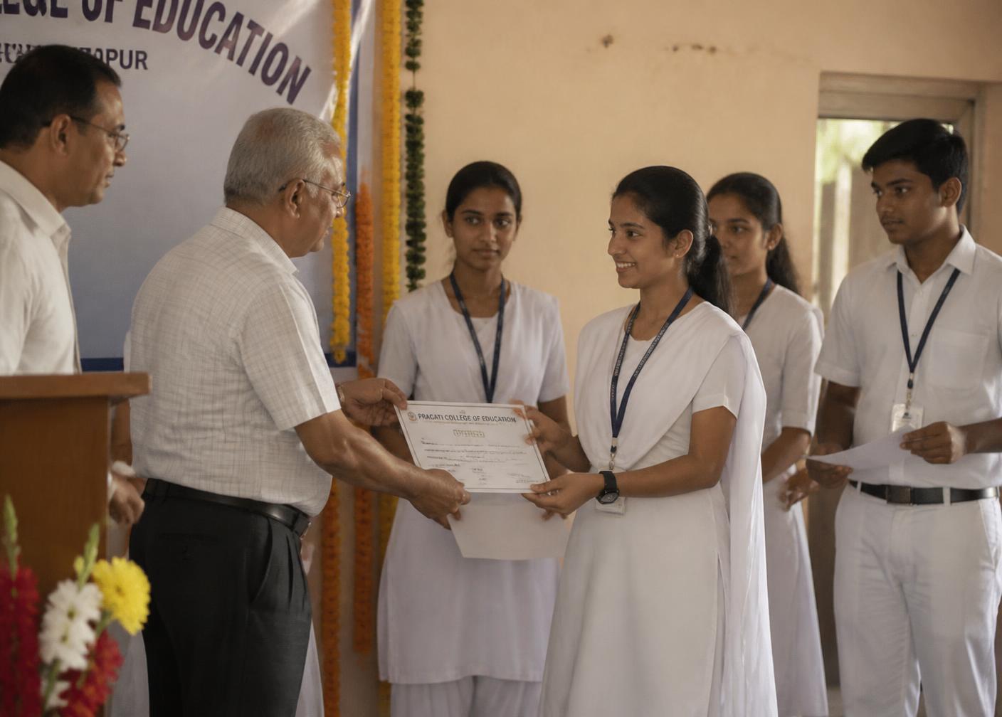 Students receiving their course completion certificates